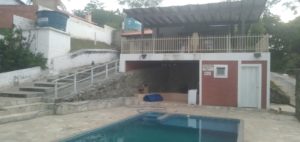 piscina vista pra casa